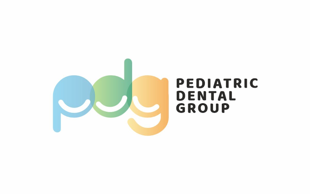 Pediatric Dental Group logo, the letters p d g drawn as three smiling faces in soft blue, green and orange